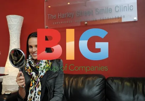 Danielle Lloyd at Dentist Smiling in Rain