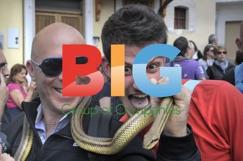 Live snakes held to statue in St. Domenico\'s procession