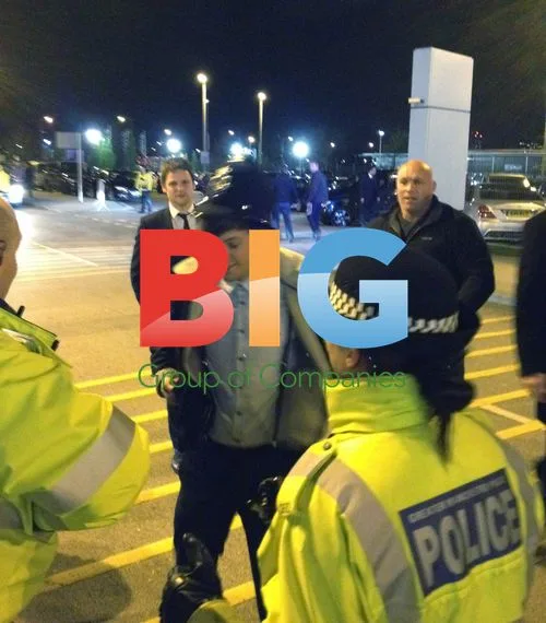 Louis Tomlinson Joking with Police at Manchester Derby