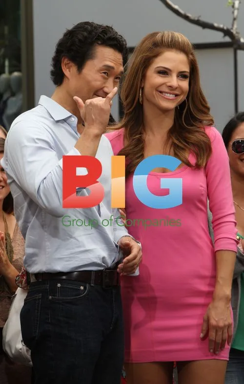 Daniel Dae Kim and Maria Menounos at 'Extra' taping