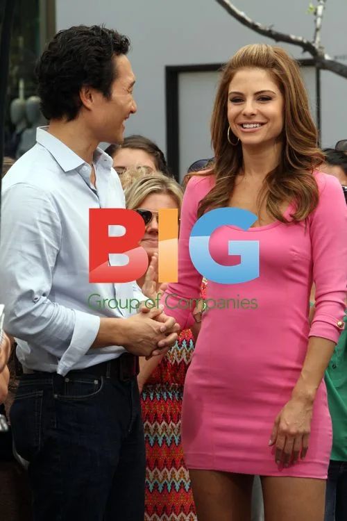 Daniel Dae Kim and Maria Menounos at 'Extra' taping
