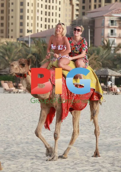 Lydia Bright enjoys camel ride in Dubai