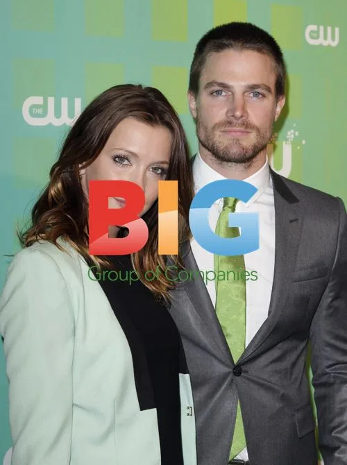 Katie Cassidy and Stephen Amell at CW Upfronts