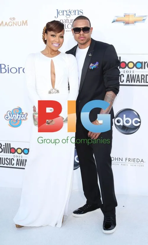 Monica and Chris Brown arrive at Billboard Music Awards