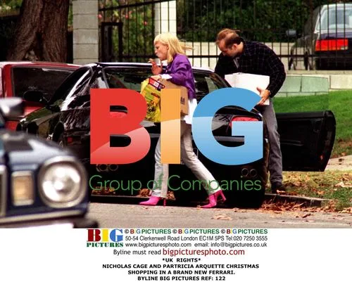NICHOLAS CAGE and PATRICIA ARQUETTE Christmas shopping in Ferrari