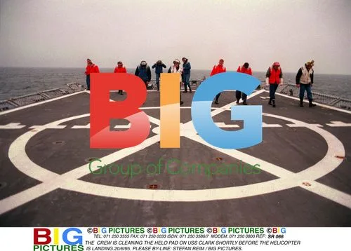 Crew Cleaning Helo Pad on USS Clark