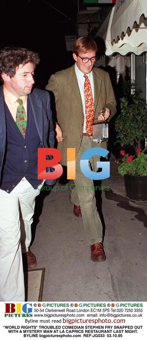 Stephen Fry out with mystery man