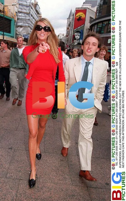 SUPERMODEL ELLE MACPHERSON CHECKS OUT FASHION CAFE SITE