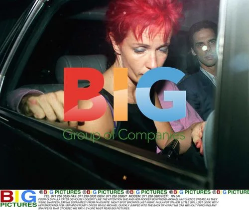 Paula Yates and Michael Hutchence Leaving Brown's