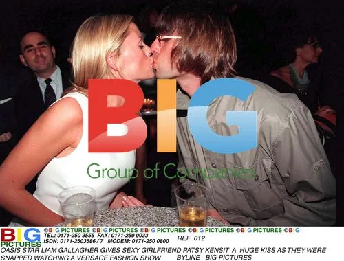Liam Gallagher kisses Patsy Kensit at Versace show