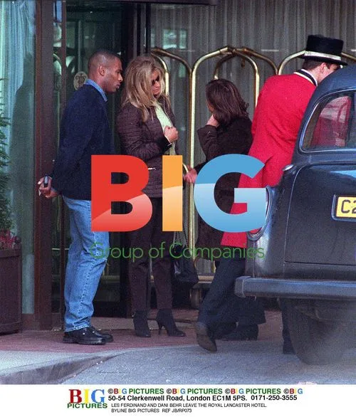 Les Ferdinand and Dani Behr Leaving Hotel