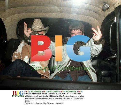Noel Gallahger and wife out in London