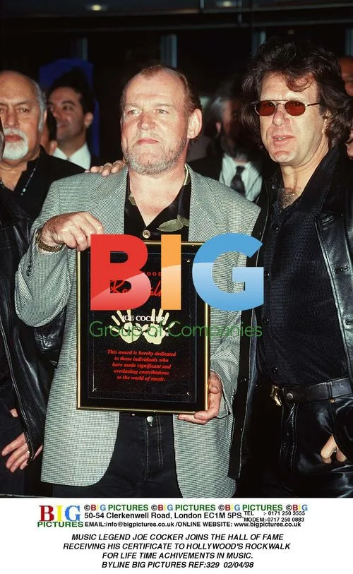 JOE COCKER RECEIVES ROCKWALK HONOR