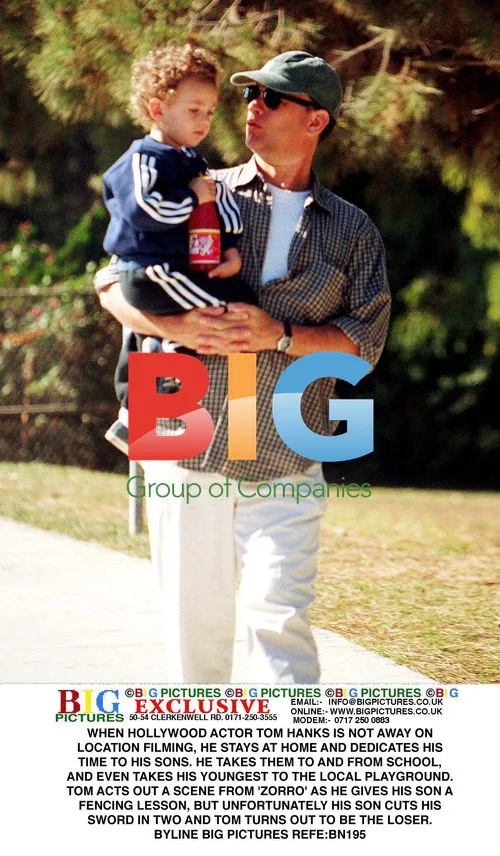 Tom Hanks Bonds with Son at Playground