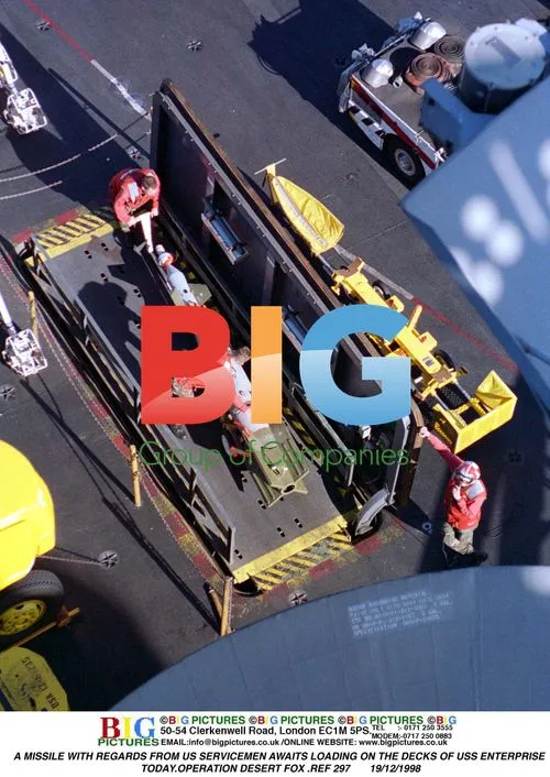 Ordnancemen move bombs on USS Enterprise