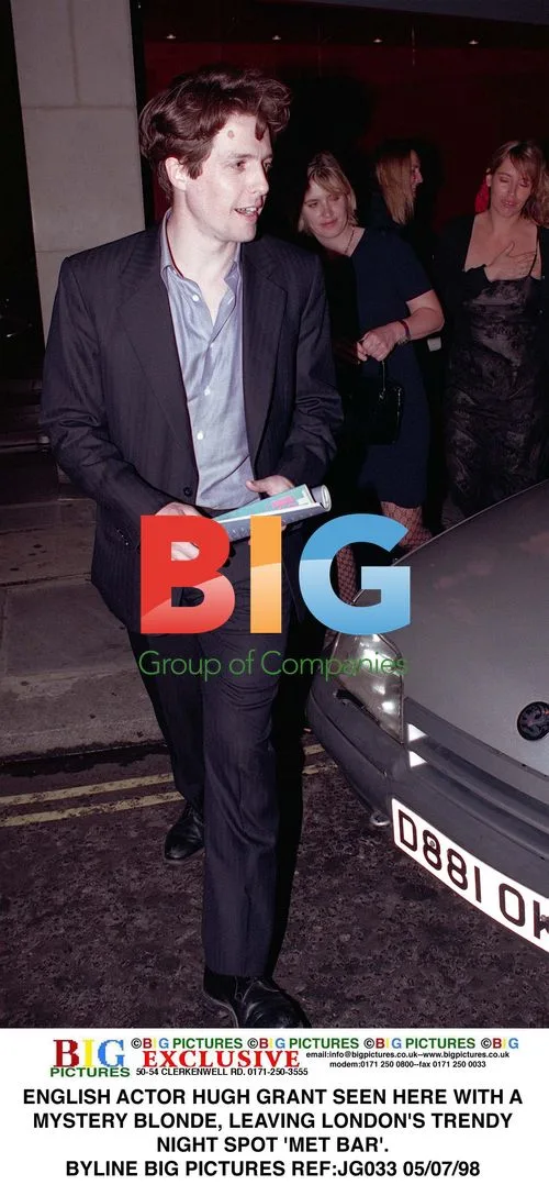 Hugh Grant Spotted with Mystery Blonde