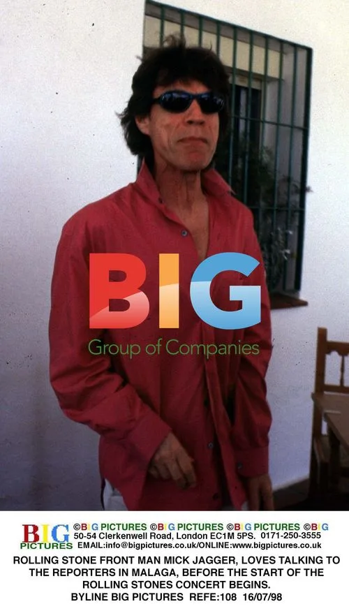MICK JAGGER Talks to Reporters in Malaga