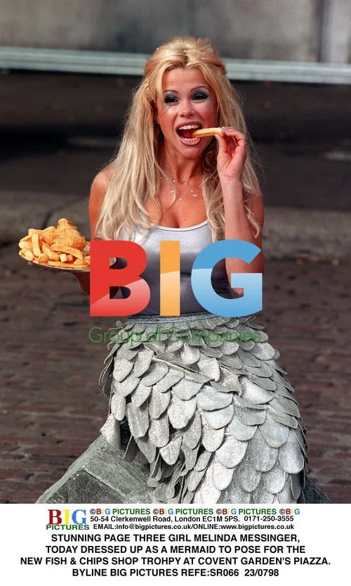 Melinda Messinger Poses as Mermaid