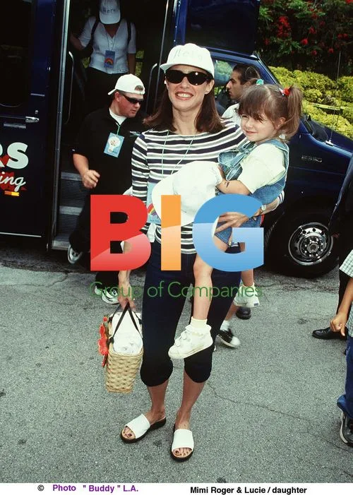 MIMI ROGER and DAUGHTER LUCIE at AIDS Charity Event