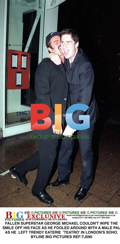 George Michael Spotted Smiling with Male Companion