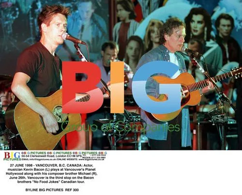 Kevin Bacon performs with brother Michael in Vancouver