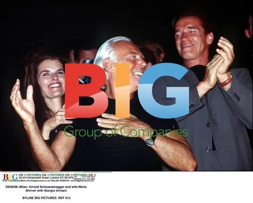 Arnold Schwarzenegger and Maria Shriver with Giorgio Armani