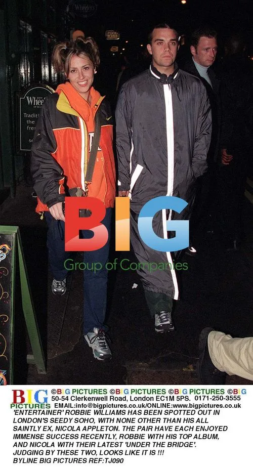 Robbie Williams & Nicola Appleton Spotted in Soho