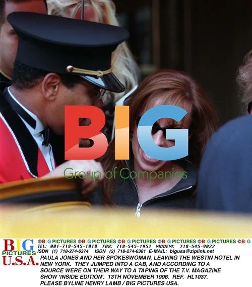 Paula Jones and spokeswoman leaving hotel