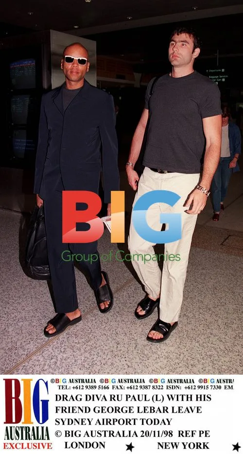 Ru Paul and George Lebar leave Sydney Airport