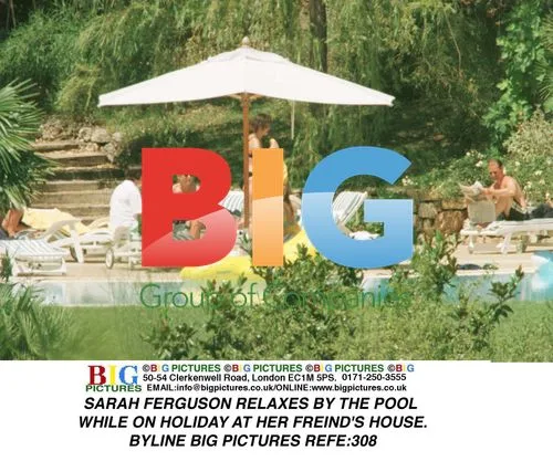 Sarah Ferguson Relaxes by Pool on Holiday