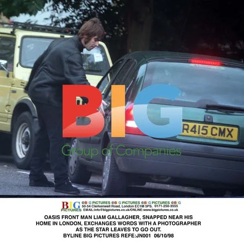 LIAM GALLAGHER EXCHANGES WORDS WITH PHOTOGRAPHER