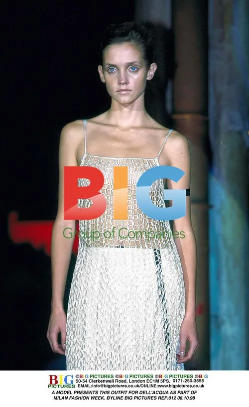 Model Presents Dell'Acqua Outfit at MFW