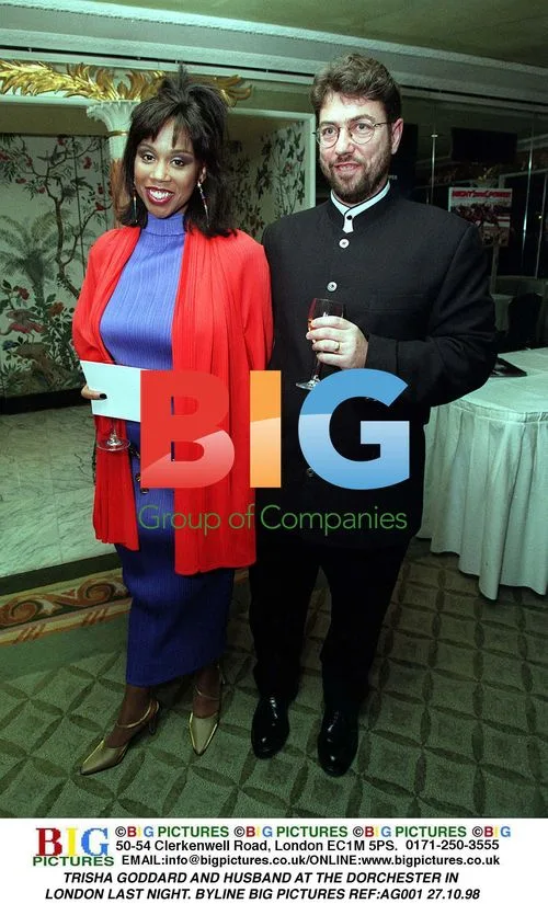 TRISHA GODDARD AND HUSBAND AT THE DORCHESTER
