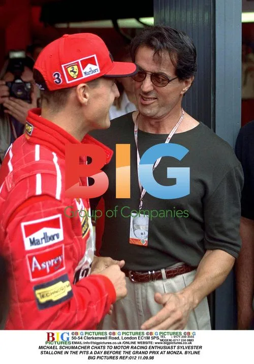 Schumacher chats to Stallone at Monza