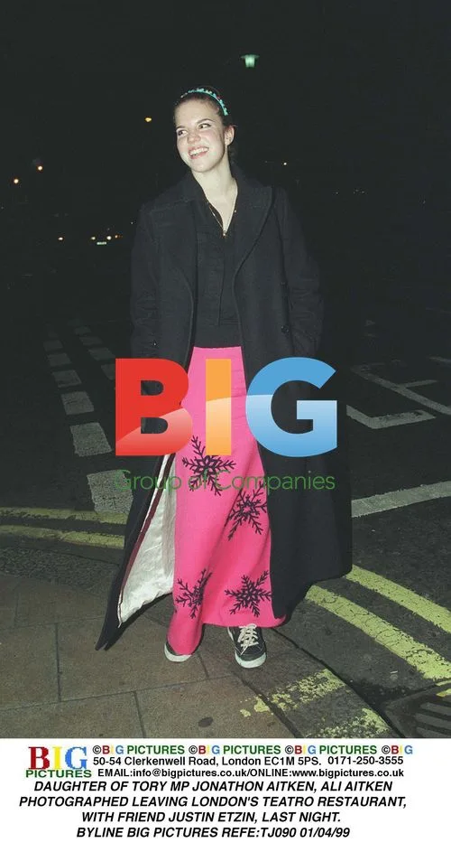 Ali Aitken leaves London restaurant with friend