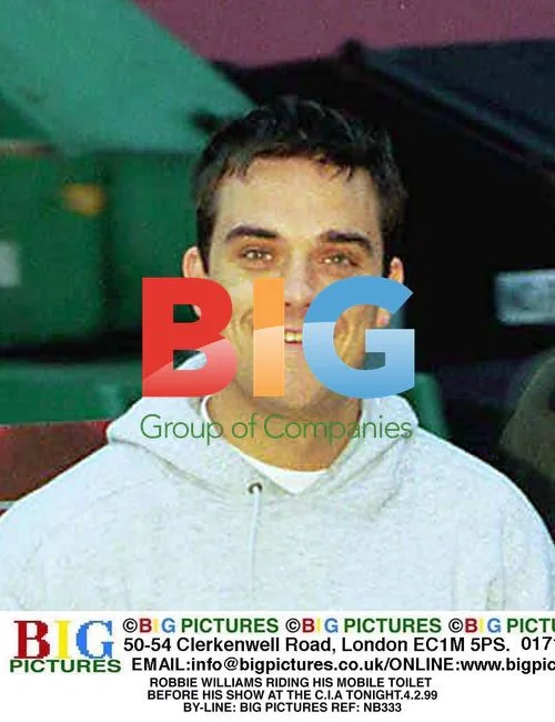 Robbie Williams Riding Mobile Toilet