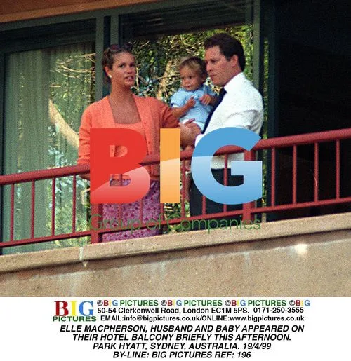 Elle Macpherson and Family on Hotel Balcony