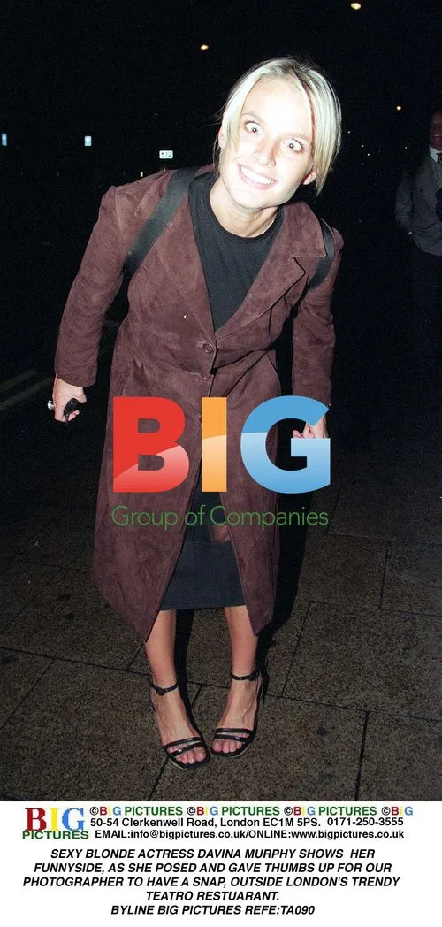 Davina Murphy Gives Thumbs Up Outside London Restaurant