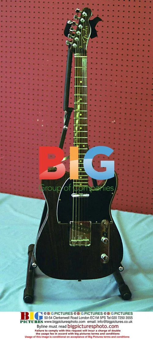 George Harrison's Fender Guitar up for Auction