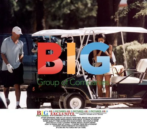 Bruce Willis and Maria Bravo at Spain Golf Range