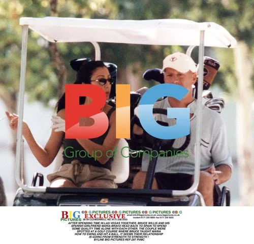 Bruce Willis and Maria Bravo at Spanish Golf Range