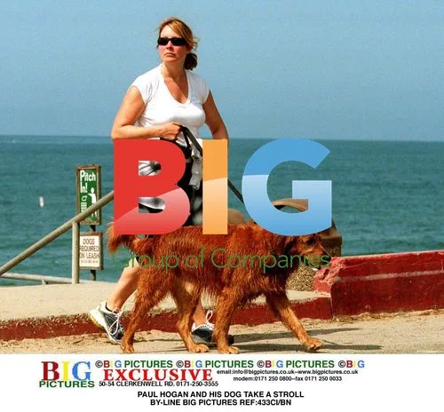 Paul Hogan and Dog Take Stroll