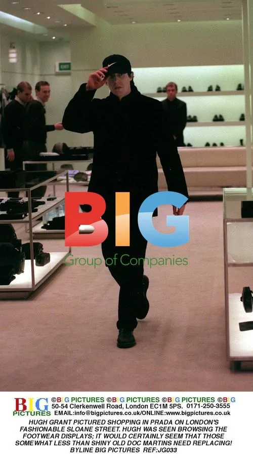 Hugh Grant Shopping at Prada in London