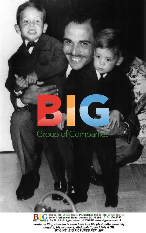 King Hussein hugs sons Abdullah and Feisal