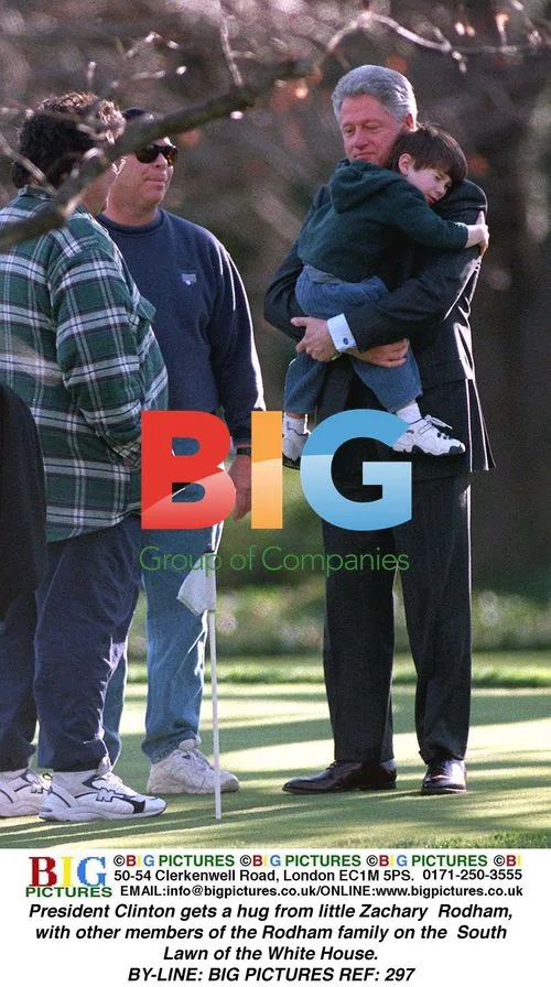 President Clinton hugs Zachary Rodham on White House lawn