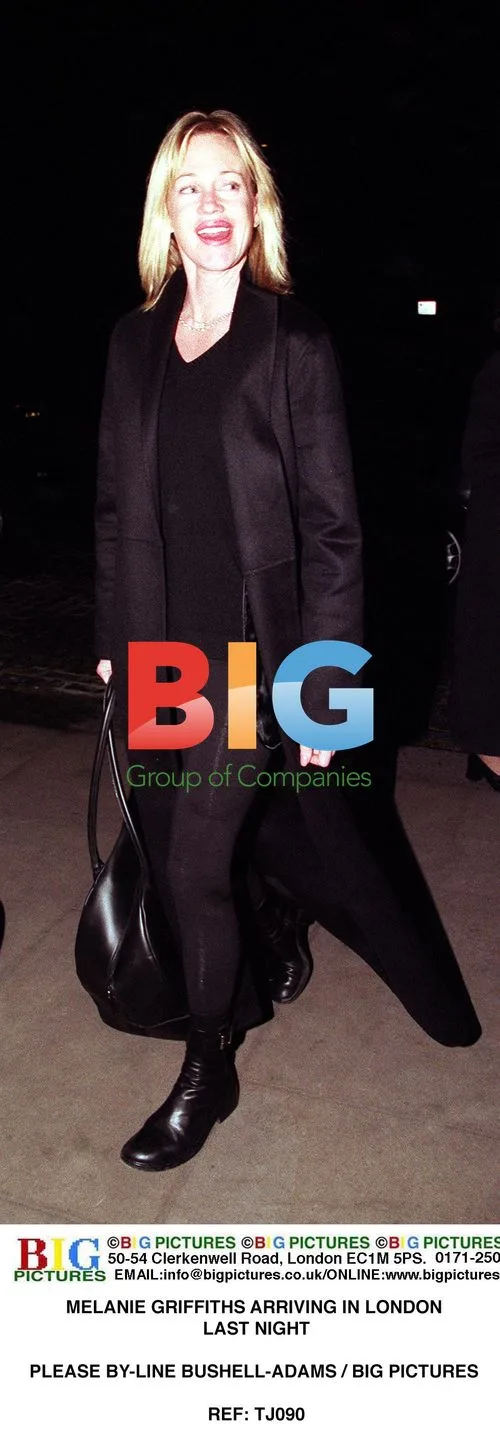 Melanie Griffiths Arrives in London