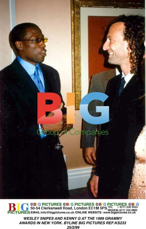 Wesley Snipes and Kenny G at 1999 Grammys