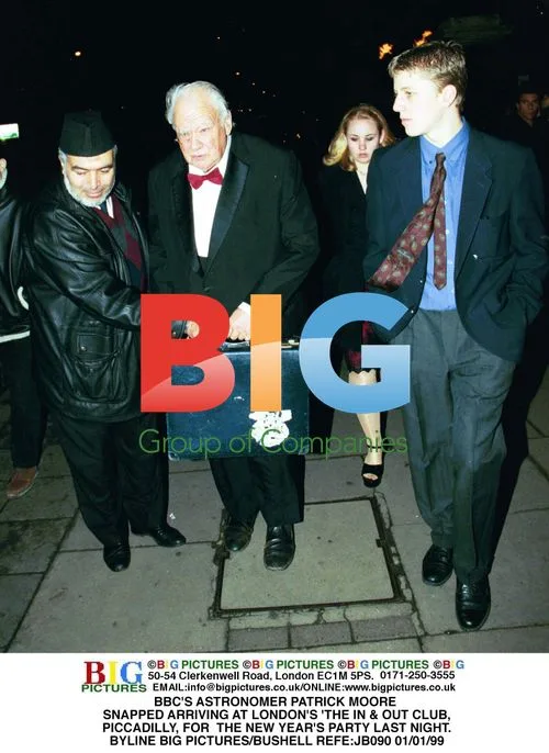 Patrick Moore arrives at New Year's party