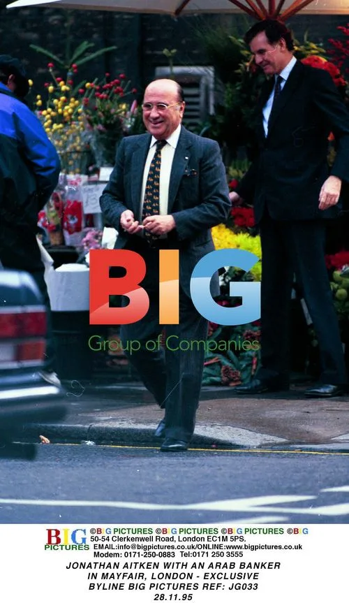JONATHAN AITKEN with Arab banker in Mayfair, London