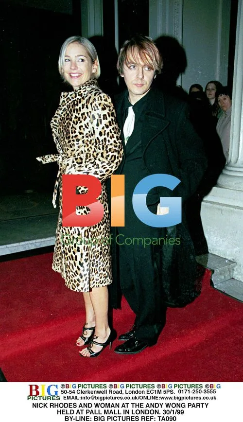 Nick Rhodes and Woman at Andy Wong Party in London